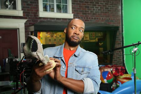 Keon Poole giving a questionable look to a display shark jaw. (National Geographic/Robert Toth)