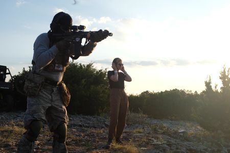 Mariana van Zeller attends shooting practice with members of the Black Cat Rifle Group. (National Geographic)