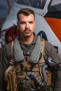 Student 1st Lt Chuck Kent poses next to a T-45. (Credit: National Geographic/Freddie Claire)