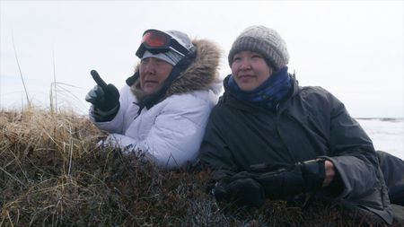 Teresa Pingayak with her granddaughter, Regina Pingayak looking for small game together. (National Geographic)