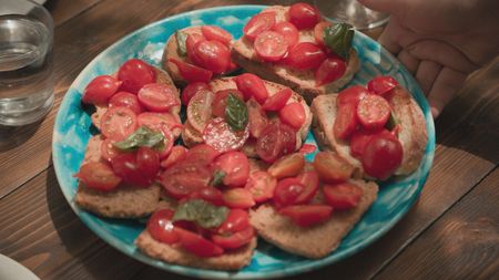TUCCI IN ITALY - “Naples & Campania” - Bruschetta made with the tomatoes grown at Azienda Agricola Rosso Vesuvio. (National Geographic)TUCCI IN ITALY