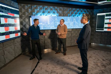 Simon Benson, Stephen Payne and Jeom Kee Paik discuss a simulation of the Titanic sinking. (National Geographic/Gary Moyes)