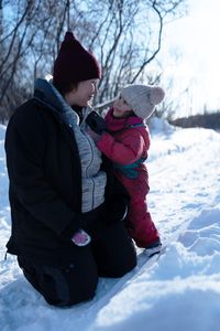 Sonta Roach with her daughter Chevelle, setting rabbit snares. (BBC Studios Reality Productions, LLC/Jayce Kolinski)