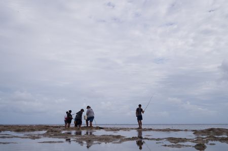 Local Niueans fish along Falala Fa Sea Track on Marine Day. National Geographic Pristine Seas explored the marine ecosystem in Niue -a small island nation in the tropical Pacific. Local and international scientists surveyed the ocean to understand its health and biodiversity. Thanks to local leadership, traditional knowledge, and strong science, the country has been able to protect large swaths of its marine environment. (National Geographic/Nova West)