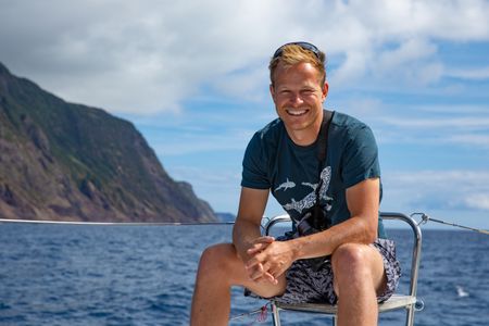Bertie Gregory on board the boat the crew call home for the shoot.  (credit: National Geographic/Jeff Hester)