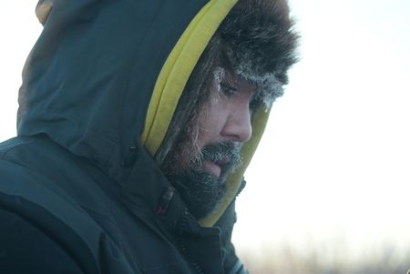 Tig Strassburg sets wolverine and wolf traps in the winter season. (National Geographic/Pat Henderson)