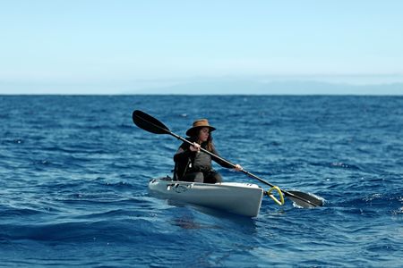 Melissa Marquez kayaks in the ocean. (National Geographic/Mario Tadinac)