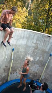 Johnny Collinson watches Angel Collinson jump on the trampoline, which is being captured by cinematographer Nick Kraus. (National Geographic/Elena Gaby)