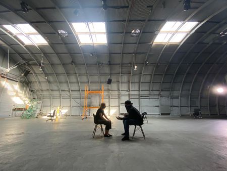 Mariana van Zeller interviews El Gringo in a hangar space in Los Angeles, California. (National Geographic)