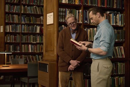 Tom Hiddleston and Professor Steven Tuck discuss the archaeological record from Pompeii. (National Geographic/Christian Black)