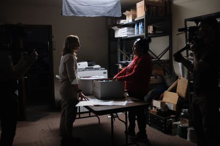 Mariana van Zeller interviews Reva about her investigation into missing people. (National Geographic)