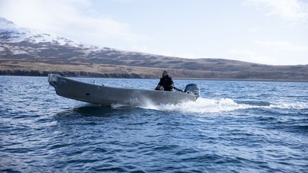 Marvin Agnot heading out on his boat. (National Geographic/Ashton Hurlburt)
