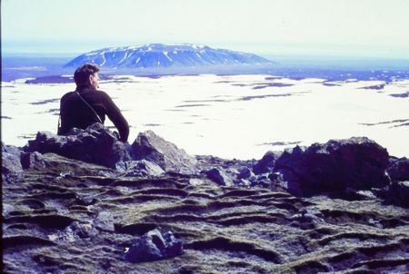 Icelandic Glaciological Society member, Árni Kjartansson, sits overlooking a glacier in Iceland. (Archival Materials Courtesy of Andri Sn&reg;r Magnason)