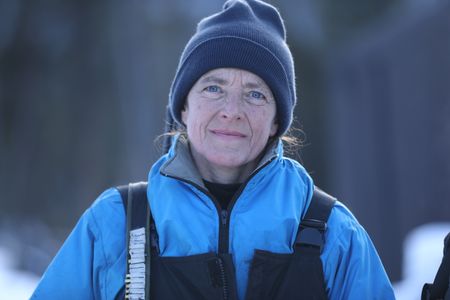 Denise Becker in the winter season with Andy Bassich at Calico Bluff, Alaska. (BBC Studios Reality Productions, LLC/JR Masters)