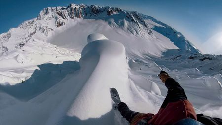 Point of view of Travis Rice as he snowboards on a mountain in Alaska.  (photo credit: Travis Rice, Inc)