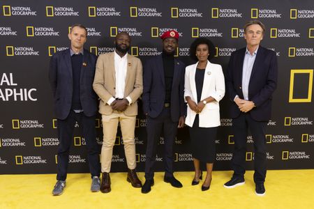 2024 TCA WINTER PRESS TOUR  - John Battsek, Moses Bwayo, Bobi Wine, Barbie Kyagulanyi, and Christopher Sharp from the “Bobi Wine: The People’s President” panel at the National Geographic presentation during the 2024 TCA Winter Press Tour at the Langham Huntington on February 8, 2024 in Pasadena, California. (National Geographic/PictureGroup)
