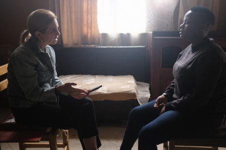 Mariana van Zeller interviews Agy in a safe house in Uganda. (National Geographic)