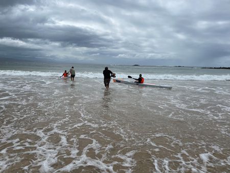 Ben Swart and Nick Bester heading out on their surf skis on Central Beach, Plettenberg Bay. (National Geographic/Robert Cowling)