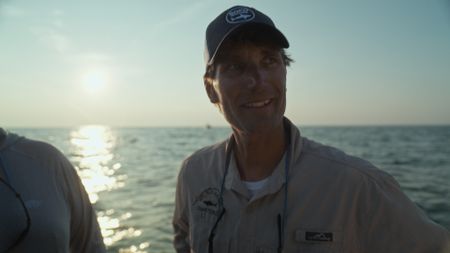 Capt. Greg Metzger after the success of catching a baby great white shark. (National Geographic/James Blake)