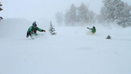 Xavier de la Rue (right) and Jeremy Jones (left) snowboard on a mountain in the Teton range, Wyoming.  (credit: Teton Gravity Research)