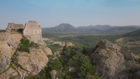 TUCCI IN ITALY - “Sardinia” - A traditional nuraghe, which can be seen dotting the Sardinian landscape. (National Geographic)TUCCI IN ITALY