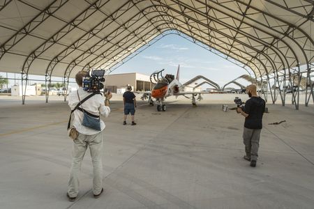 DOP Jon Southgate-Sayers and Camera Assistant Charlie Perera filming a student and instructor doing their final checks before taxiing. (National Geographic/Chris Parkin)