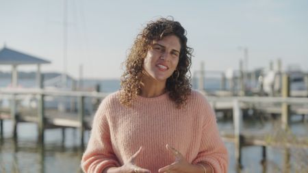 Diva Amon concluding that human actions has a direct impact on shark behaviors and their habitats. (National Geographic)