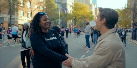 Antoni Porowski meets Stacey from TeamWRK running group at the New York City Marathon. (National Geographic)