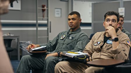 Student Captain Micah Nissly (left) in a pre-flight briefing. (Credit: National Geographic)