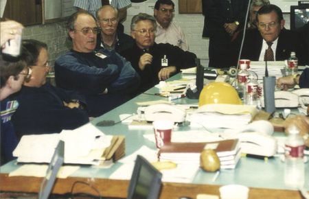 Special Agent in Charge Bob Ricks and Special Agent Weldon Kennedy attend a meeting at the FBI Command Center in Oklahoma City, Okla. in April 1995, after the bombing of the Alfred P. Murrah Federal Building. (FBI)