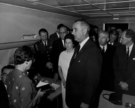 Lyndon B. Johnson is sworn in as President of the United States during ceremony aboard Air Force One, Nov. 22, 1963, in Dallas. (Cecil Stoughton/White House Photographs/John F. Kennedy Presidential Library and Museum, Boston)