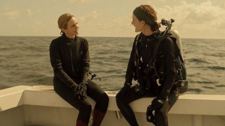 Mariana van Zeller interviews Cathryn after their shark dive. (National Geographic)