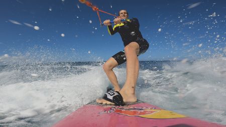 Justine Dupont is pulled out to the waves by a jet ski at Jaws.  (Mandatory photo credit: Justine Dupont)