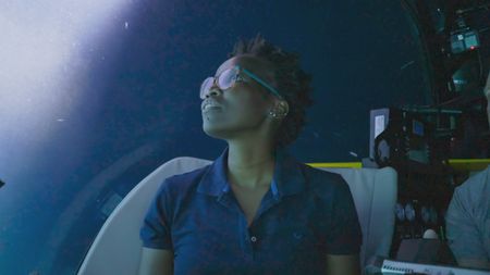 Zoleka Filander looks out of one of the OceanXplorer's submersibles, slightly anxious as they pass through the Gulf Streamñthe fastest flowing ocean current on the planet.  (National Geographic)