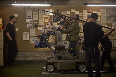Host and Executive Producer Tom Hiddleston is filmed in studio, behind-the-scenes of Pompeii: Out of Time with Tom Hiddleston. (National Geographic/Christian Black)