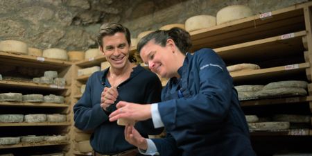 Antoni Porowski visits the cheese basement of Fromagerie Quatrehomme with owner Nathalie. (National Geographic)