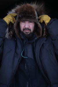 Tig Strassburg bundled up in furs for the harsh winter season and weather. (National Geographic/Pat Henderson)