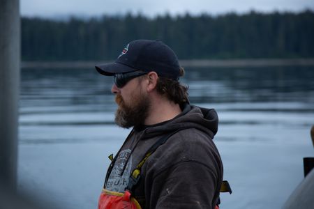 Carl Hernandez fishes for salmon. (National Geographic/Lukas Taylor)