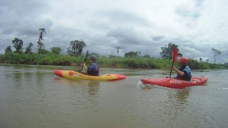 Chris Korbulic and Hendri Coetzee kayak down a calm section of river.  (mandatory photo credit: Benjamin Stookesberry)