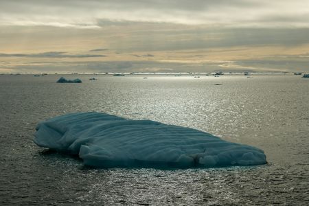 The icy ocean at golden hour off Svalbard, Norway. (National Geographic/Mario Tadinac)