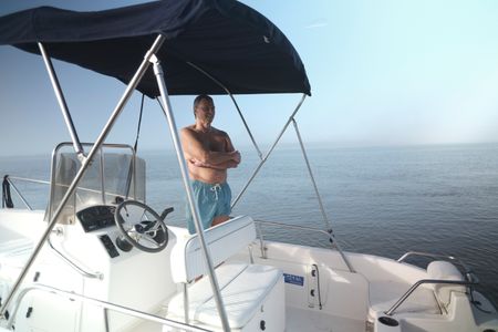 Gene Brooks on his boat on the Wilmington River. (National Geographic/Martin Cass)