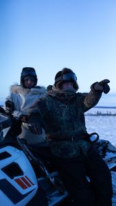 Chip Hailstone spots caribou in the distance while hunting with his wife, Agnes. (BBC Studios Reality Productions, LLC/Ashton Hurlburt)