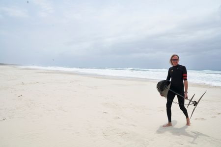 Christian Bungate with his foil board at Cabarita Beach. (National Geographic/Justine Kerrigan)