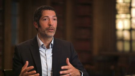 Dartmouth College historian Dr. Matthew Delmont sits for an interview at Dartmouth College in Hanover, N.H. (National Geographic)