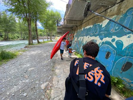 Gerd Serrasolses, Ali Casas, and their children get kayaks out from the garage on their way to the river in Sort, Spain.  (National Geographic/Gene Gallerano)