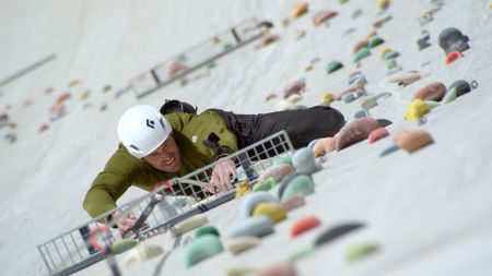 Chris nears the end of the fourth pitch, on the challenging climb on Luzzone dam, in Switzerland.  (Credit: National Geographic)