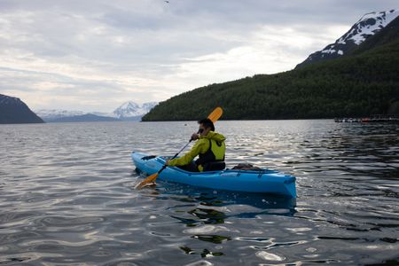 Alta, Norway - Albert Lin kayaking in Alta, Norway. (National Geographic/Hugh Campbell)