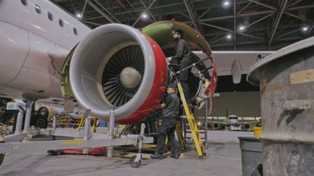 Inderjit Banwait, Aircraft Maintenance Engineer at Air Canada, and Irving Chevez, Lead Aircraft Maintenance Engineer at Air Canada, inspect one of the A320 engines. (Arrow International Media Ltd & Cantina Media)