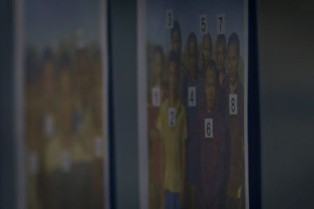Photos of the twenty-six hostages who were held captive by pirates for over four ears following the hijacking of the Naham 3 fishing vessel. (©2019 MCN International Pte Ltd. All Rights Reserved.)