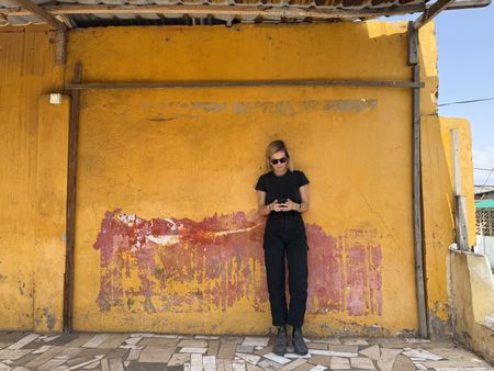 Mariana van Zeller stands for a portrait in Accra, Ghana. (National Geographic/Daniel Hollis Diamond)